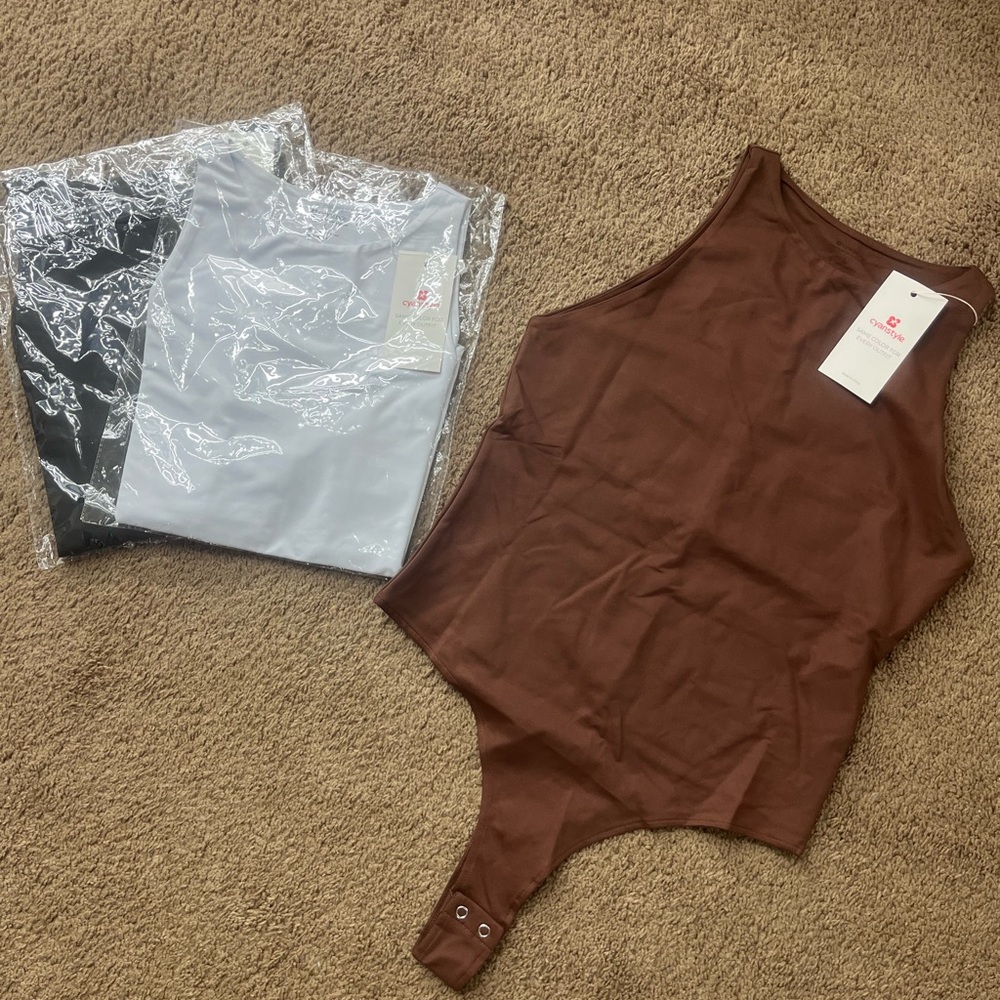 Women's One Piece Slimming Body Suits
Set of White, Black and Brown.